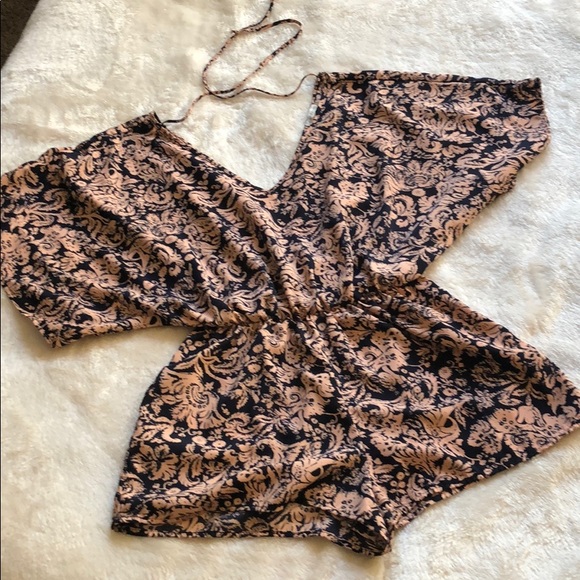 Charlotte Russe Other - Beautiful Romper size Medium